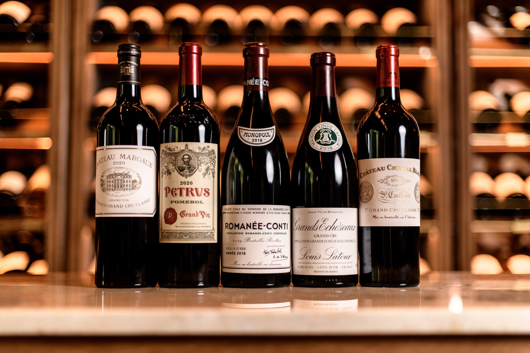 Selección de vinos franceses de lujo: Château Margaux, Pétrus, Romanée-Conti, Grands Échézeaux y Cheval Blanc colección exclusiva, The Library Wine Boutique Madrid.